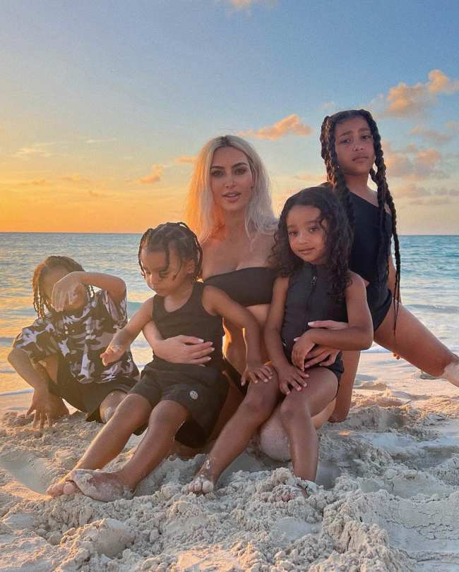              Kardashian says the music helps calm her kids down before school            
