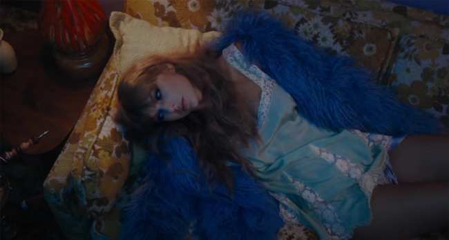 THE INSPIRATION Swifts fluffy Free People coat from the Lavender Haze music video