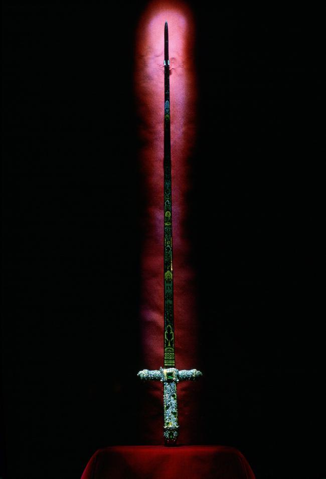 The Sword of Offering glimmers in a case at the Tower of Londons Jewel House