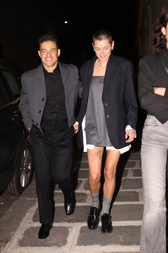 Rami Malek y Emma Corrin mostraron su amor al salir de la fiesta posterior de Miu Miu durante la Semana de la Moda de París el martes.