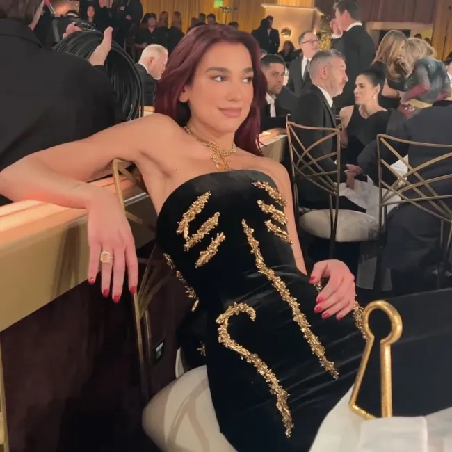 Dua Lipa comparte un video de ella luchando por sentarse con un elaborado vestido de los Globos de Oro.