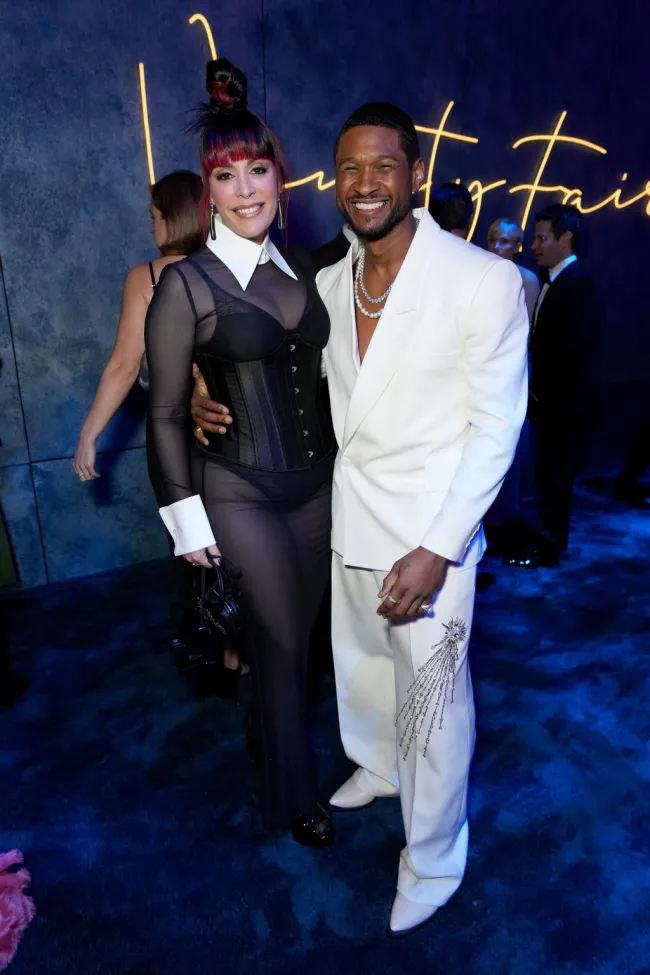 Usher y Jennifer Goicoechea