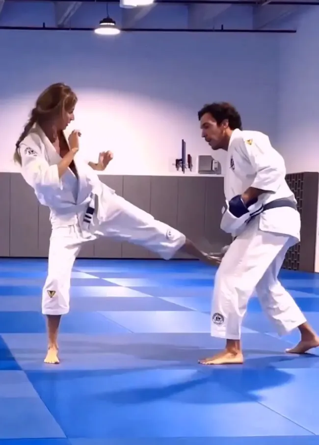 Joaquim Valente y Gisele Bündchen practicando jiu jitsu.