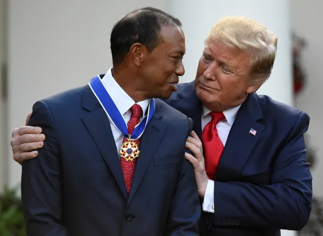Tiger Woods y Donald Trump.